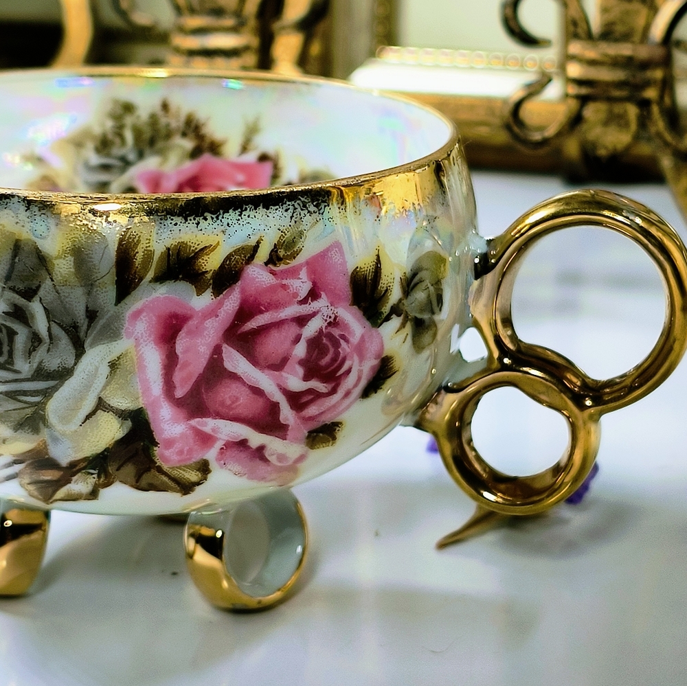 Beautiful three-legged teacup. The pattern consists of large bold roses, brown l - Picture 3 of 8